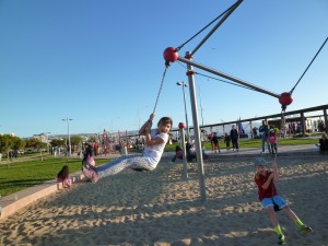 swinging on the beach