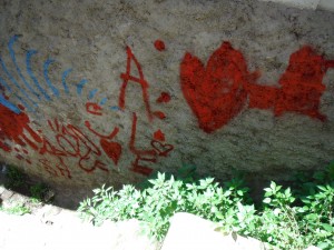 tagged wall with both kids art